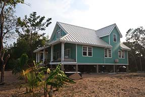 Belize real estate with new house on private beach for sale now