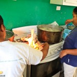 Belizean women preparing some "boil up", and favorite food in Belize