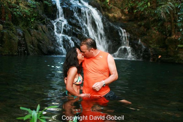 A couple enjoys an intimate moment at the top of Antelope Falls