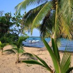 private boat on prime beachfront Belize real estate